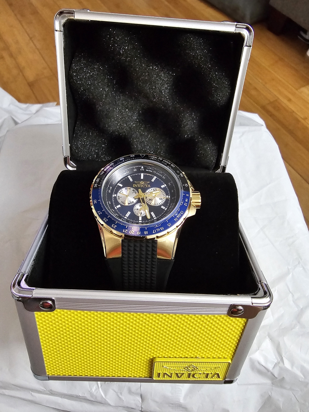 Invicta Gold-Tone Watch with Blue Dial and Black Strap
